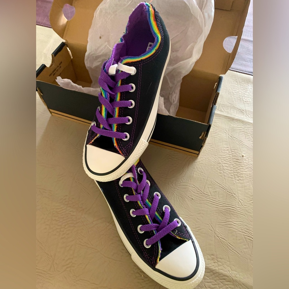 Black converse sneakers with rainbow detail
